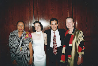 Sean, his wife, another guest, and Sandra at their wedding reception