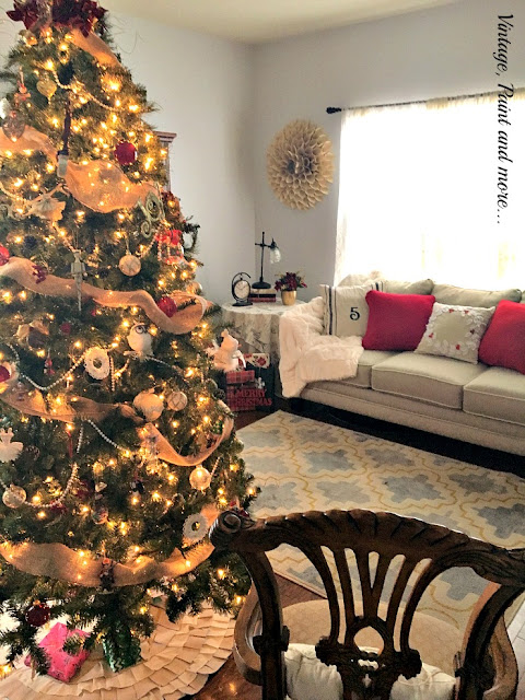 living room view with Christmas tree, stenciled pillows, sweater pillows, felt wreath pillow