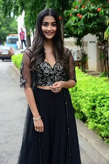 Actress Pooja Hegde Stills in black dress at Valmiki movie Press Meet