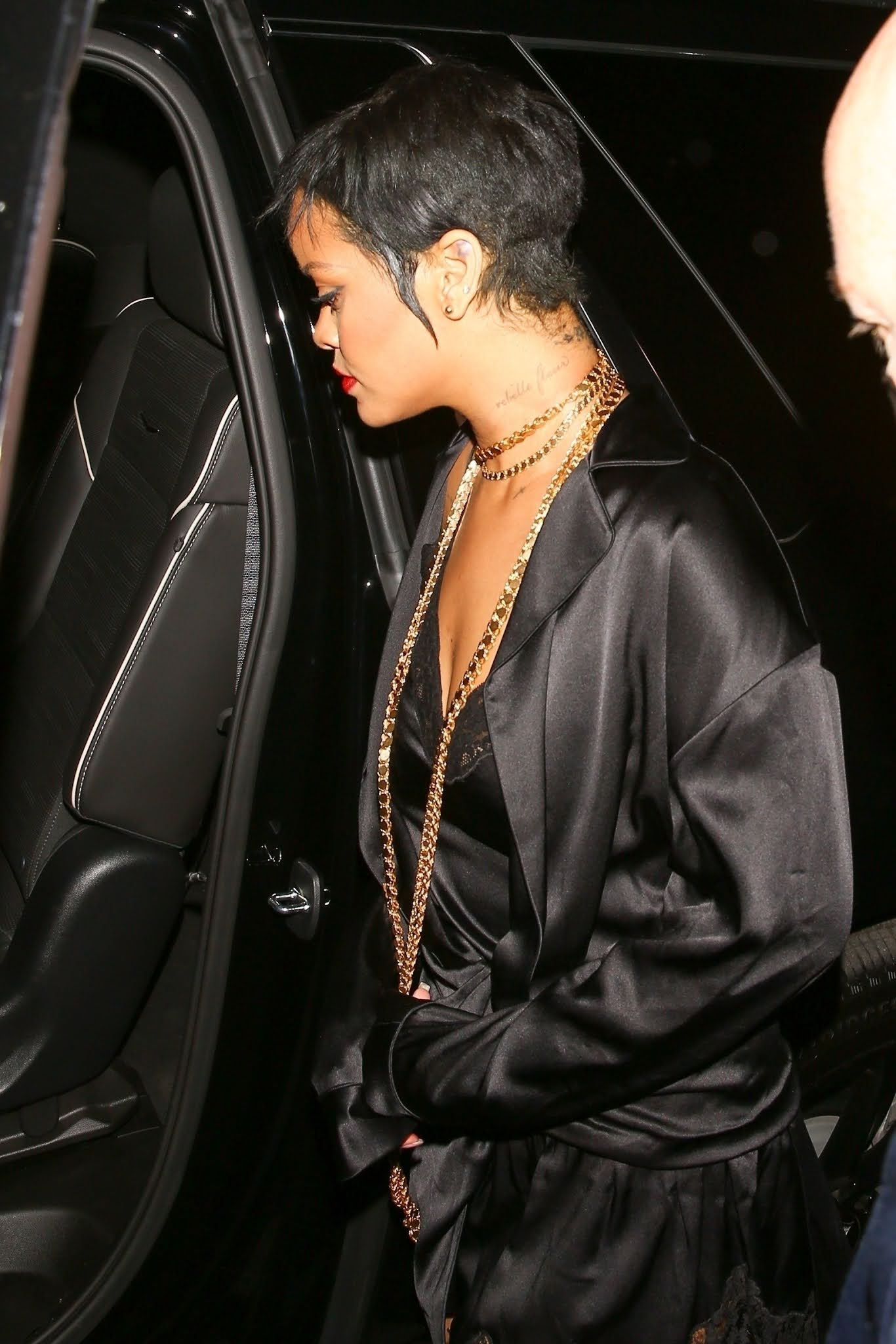 Rihanna in a slinky lingerie set for night out with friends at Delilah nightclub.