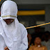 Wanita Aceh menangis meminta berhenti disebat kerana kesalahan berzina
