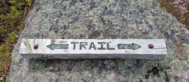 East Coast Trail wooden sign on Newfoundland coast.