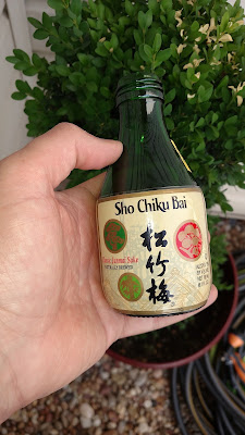 Small 6oz bottle of sake, front