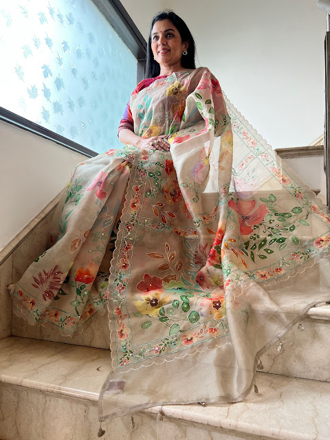 The Captivating Chikoo Kora Silk Hand Painted and Hand Embroidered Saree