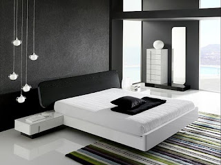 white bed and black pillow