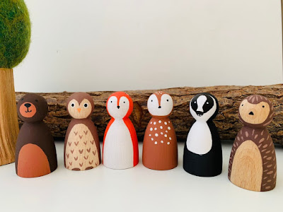 Creative peg dolls carved in wood