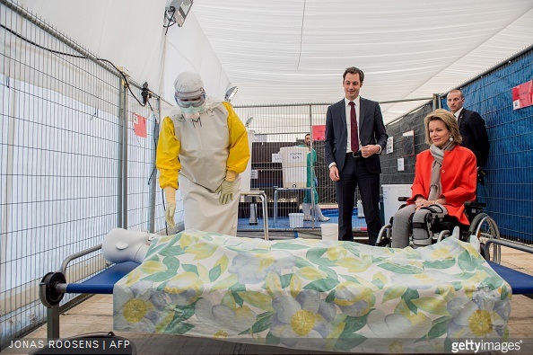 Queen Mathilde of Belgium and Vice-Prime Minister and Minister of Cooperation Development, Digital Agenda, Telecom and Postal services Alexander De Croo