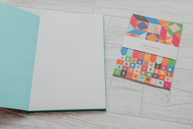 Dotted notebook and geometric stickers