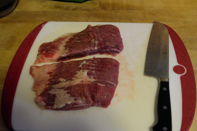 The flank steak being sliced for the beef and broccoli stir fry.