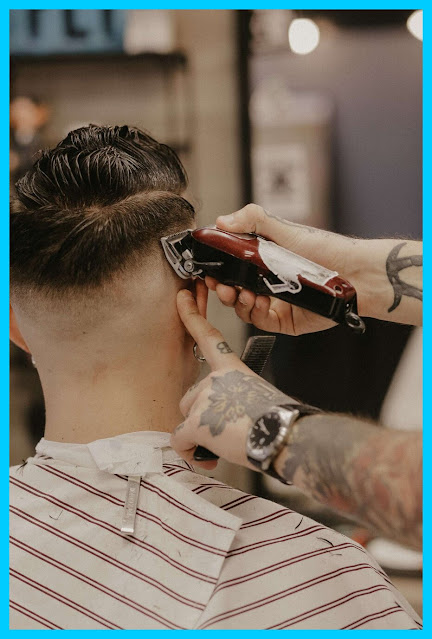 this is a picture of hair clippers being used to shave someones hair