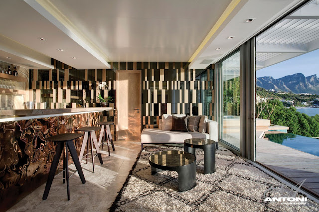 Picture of modern bar room with brown furniture