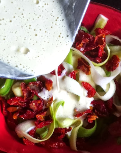 Raw Zucchini Fettuccine and Sun Dried Tomatoes in Cashew Sour Cream Sauce