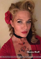 freep, freep shawn huff, shawn huff taking freep selfie in red dress with tattoos body along red rose in hair