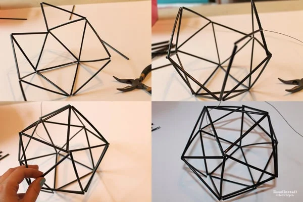 It's got 20 triangular faces. Twist up the last wire and thread the remainder of it through the closest straw.