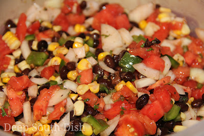 Garden Fresh Salsa, made with juicy tomatoes, sweet Vidalia onions, crisp sweet garden bell peppers, spicy fresh jalapeno, sweet corn on the cob and fragrant garden cilantro.