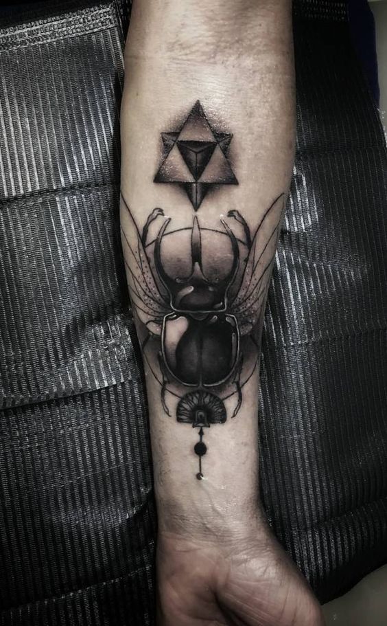 Winged-Scarab-Dot-Work-Forearm-Tattoo