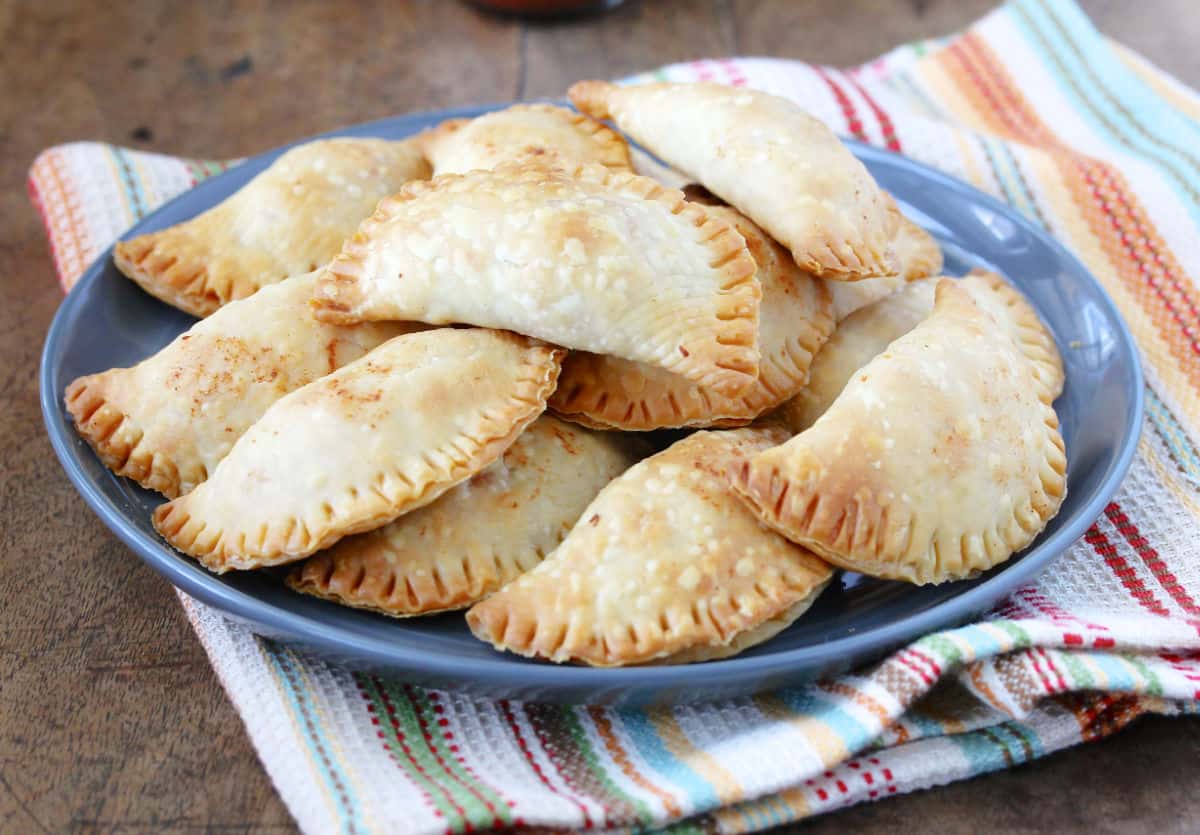 Mini Chicken Empanadas on a blue plate.