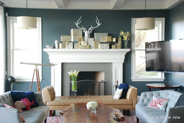 silver and gold gifts on a mantle