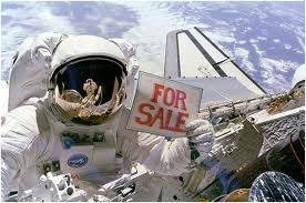 Astronaut Holding For Sale Sign - Source: NASA