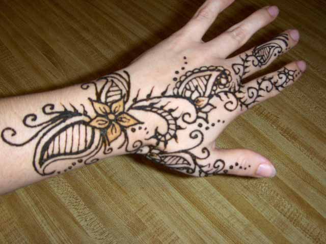 Flower Mehndi Designs Henna Tattoos Patterns 2011