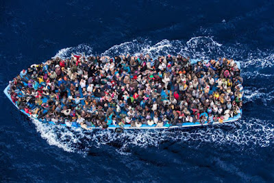 Refugees in boat heading for Europe Italy