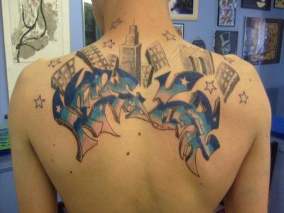 Above This graffiti tattoo design combines the words New York with a