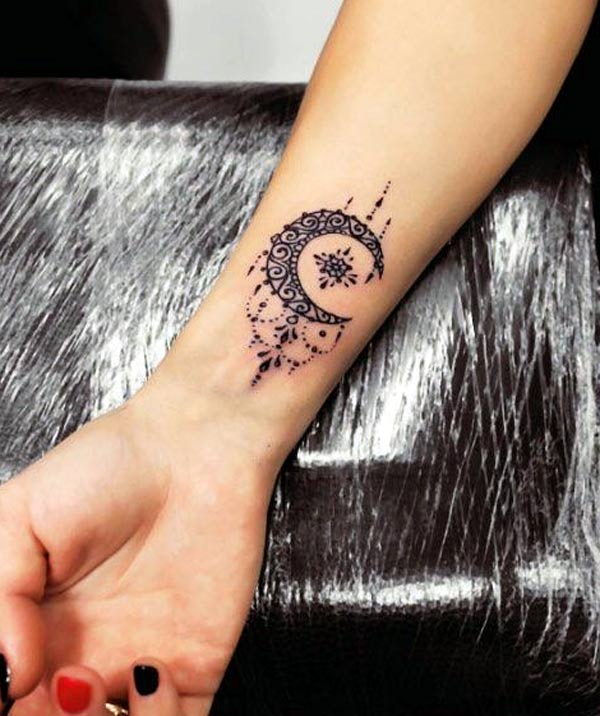 so beautiful and cute small tattoo crescent moon design on the wrist for feminine