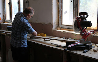 Dad making a start cutting the spud tower planks