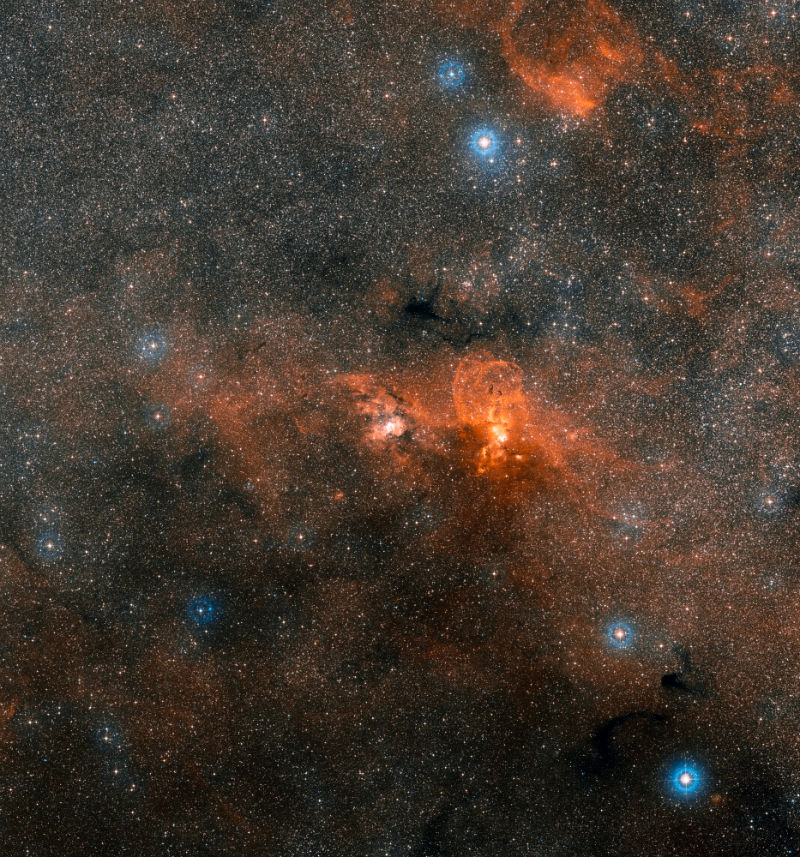 This wide-field image, based on data from Digitized Sky Survey 2, shows the whole region around the cosmic factory NGC 3603, located 22 000 light-years away.