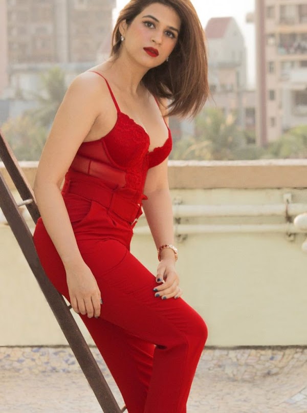 shraddha das red outfit busty south indian