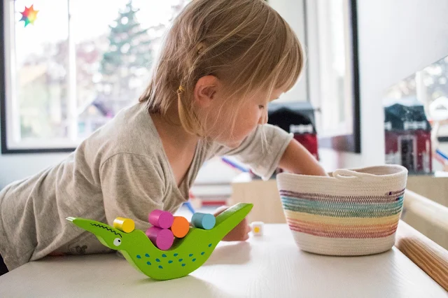 Balancing games on our 3-year-old's Montessori play shelves! 10 balancing games for children!