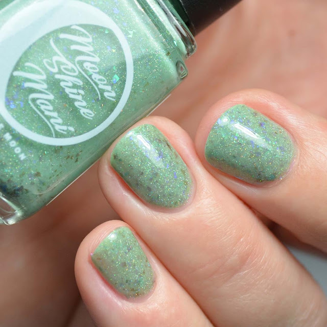 green nail polish with flakies