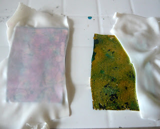 My polymer clay sheets are covered with a thin translucent clay sheet