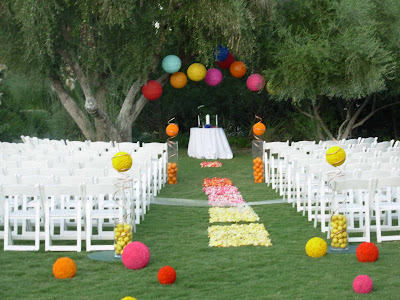 The wedding was no less colorful The ceremony was held at sunset under a 