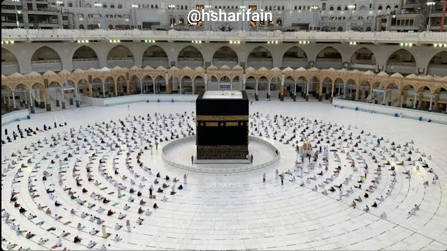 Waiting for prayer at the Kaaba inside Al-Masjid Al-Haram