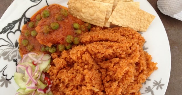 Nasi tomato,ayam masak merah,acar timunyummmmmmmmmeeeeyyy!