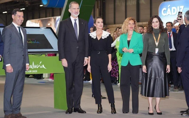 Queen Letizia wore a new poplin collar sweater by Sandro. Hugo Boss Tapia black trousers. Gold and Roses earrings