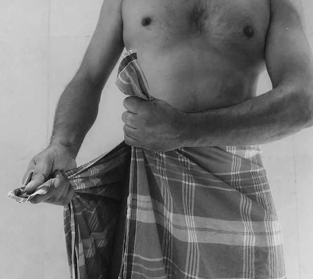 Men Adjusting Lungi and Sarong