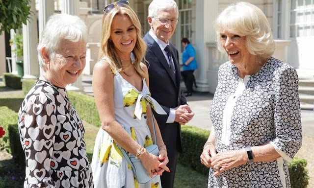 Amanda Holden and Mala Breeze attended a reception hosted by Duchess of Cornwall. The Duchess wore a printed dress