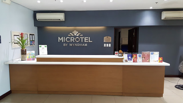 Front Desk of Microtel Acropolis in Eastwood Quezon City