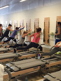 reverse lunges on reformer, pilates body class 