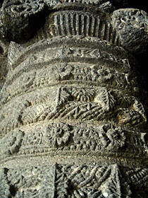 decorated stone pillar at Aurangabad temple caves