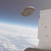 Russian aviator witnesses close encounter with pair of UFOs in July 2002. ‎