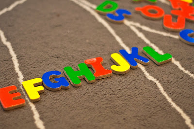 One Activity, Many Ways: Wooden ABC Puzzle | San Antonio Baby Sign Language Classes