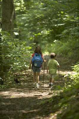 Two children hiking.