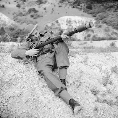 A member of the Home Guard demonstrates the EY rifle with Number 68 anti tank grenade Dorking 3rd of August 1942