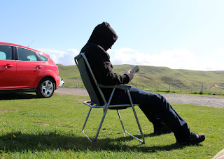 CJC reading at Machir Bay carpark