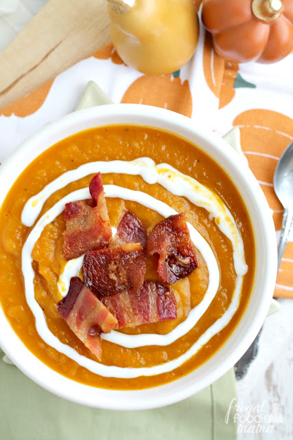 Roasted butternut squash & creamy pumpkin are blended together with warm spices & a little kick of heat in this perfect for fall Chipotle Butternut Squash & Pumpkin Soup.