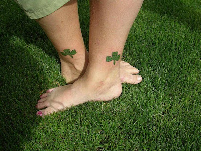 Pictures Of 4 Leaf Clover Tattoos girls tattoos on feet with shamrock tattoo