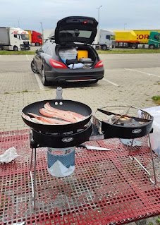 Cooking up breakfast by the car